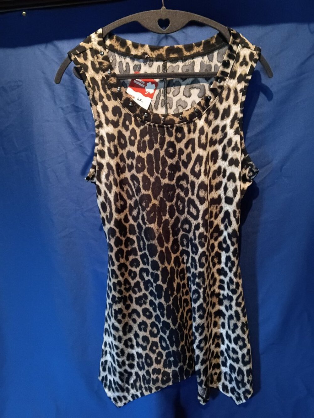 NWOT Leopard SharkBite top w/ metal studs around collar. Medium